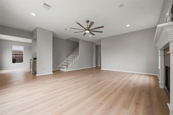 Empty room, Fireplace, Interior, Recessed Lighting, Wood Texture Flooring