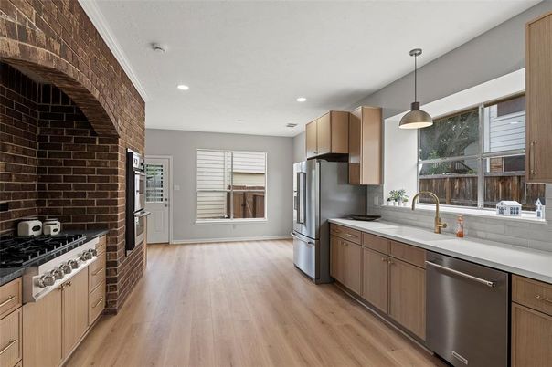 Interior, Kitchen, Pendant Lights, Recessed Lighting, Stainless Steel Appliances, Stone Walls, Wood Texture Flooring