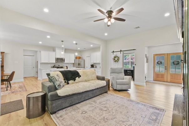 Dining room, Interior, Kitchen, Living room, Pendant Lights, Recessed Lighting, Stainless Steel Appliances, Wood Texture Flooring