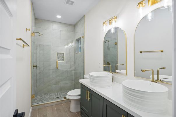 Bathroom, Dual Sink Vanities, Glass Shower, Interior, Recessed Lighting, Wood Texture Flooring