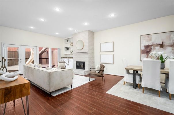 Dining room, Fireplace, Interior, Living room, Recessed Lighting, Stone Walls, Wood Texture Flooring