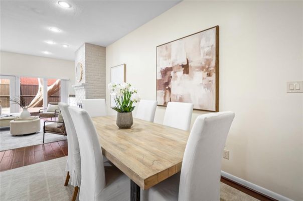 Dining room, Fireplace, Interior, Living room, Recessed Lighting, Wood Texture Flooring