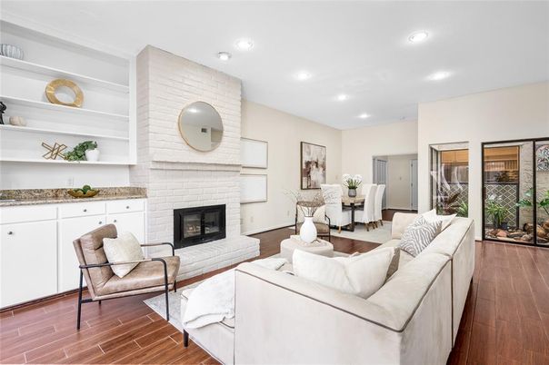 Dining room, Fireplace, Interior, Living room, Recessed Lighting, Wood Texture Flooring