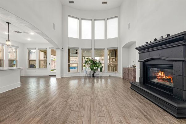 Fireplace, Interior, Pendant Lights, Recessed Lighting, Wood Texture Flooring