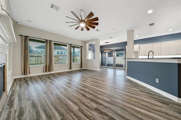 Empty room, Fireplace, Interior, Pendant Lights, Recessed Lighting, Wood Texture Flooring