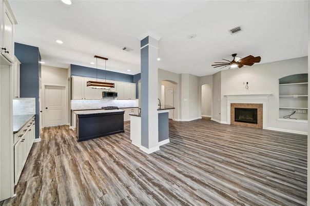 Fireplace, Interior, Kitchen, Pendant Lights, Recessed Lighting, Wood Texture Flooring