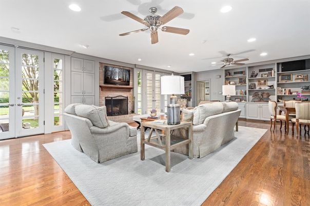 Dining room, Fireplace, Interior, Living room, Recessed Lighting, Wood Texture Flooring