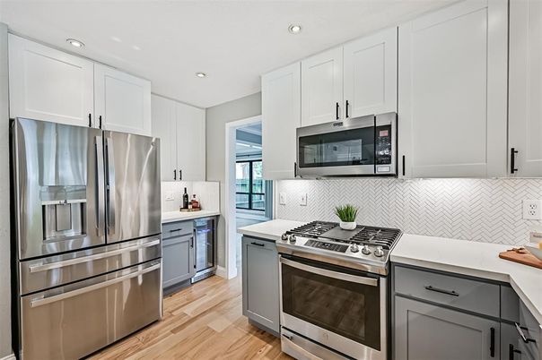 Interior, Kitchen, Recessed Lighting, Stainless Steel Appliances, Wood Texture Flooring