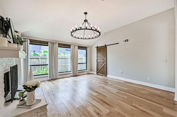 Chandelier, Empty room, Fireplace, Interior, Pendant Lights, Wood Texture Flooring