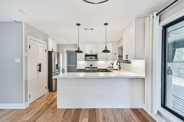 Interior, Kitchen, Pendant Lights, Recessed Lighting, Stainless Steel Appliances, Wood Texture Flooring