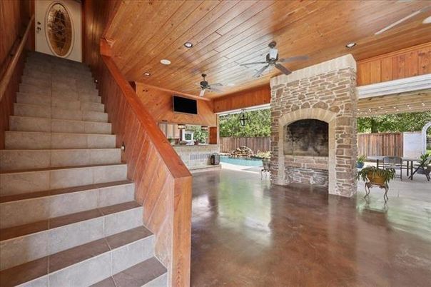 Exterior, Fireplace, Pool, Recessed Lighting, Stone Walls, Wooden Ceilings