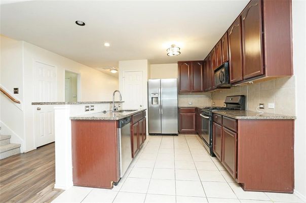 Interior, Kitchen, Recessed Lighting, Stainless Steel Appliances, Wood Texture Flooring