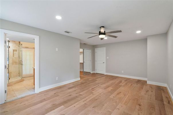 Bathroom, Empty room, Glass Shower, Interior, Recessed Lighting, Wood Texture Flooring