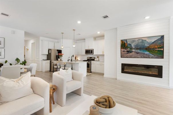 Dining room, Fireplace, Interior, Kitchen, Pendant Lights, Recessed Lighting, Stainless Steel Appliances, Wood Texture Flooring