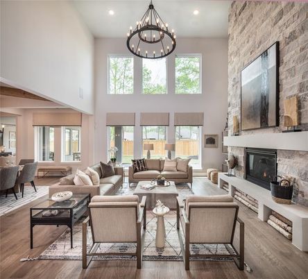 Chandelier, Dining room, Fireplace, Interior, Living room, Recessed Lighting, Stone Walls, Wood Texture Flooring