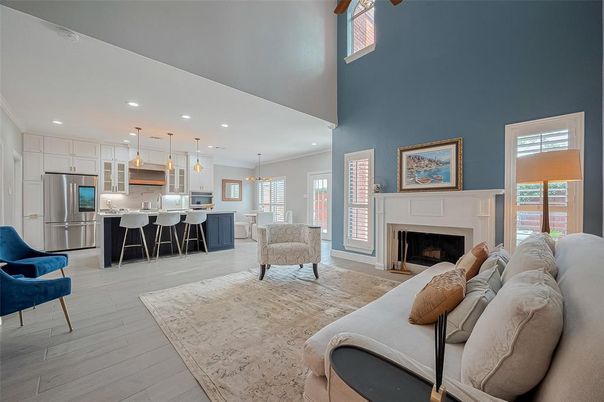 Dining room, Fireplace, Interior, Kitchen, Living room, Pendant Lights, Recessed Lighting, Stainless Steel Appliances, Wood Texture Flooring