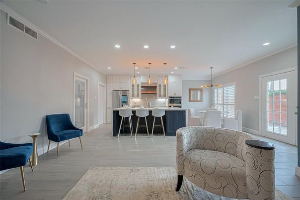 Dining room, Interior, Kitchen, Pendant Lights, Recessed Lighting, Stainless Steel Appliances, Wood Texture Flooring