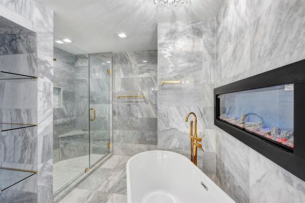 Bathroom, Free Standing Baths, Glass Shower, Interior, Marble, Marble Walls, Recessed Lighting