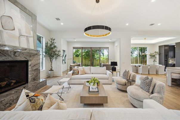 Dining room, Fireplace, Interior, Living room, Pendant Lights, Recessed Lighting, Wood Texture Flooring