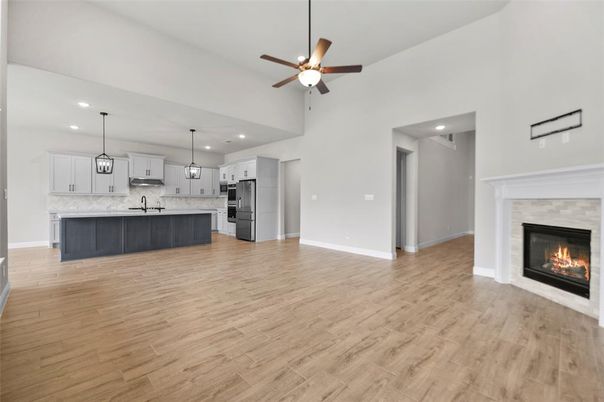 Fireplace, Interior, Kitchen, Pendant Lights, Recessed Lighting, Stainless Steel Appliances, Wood Texture Flooring