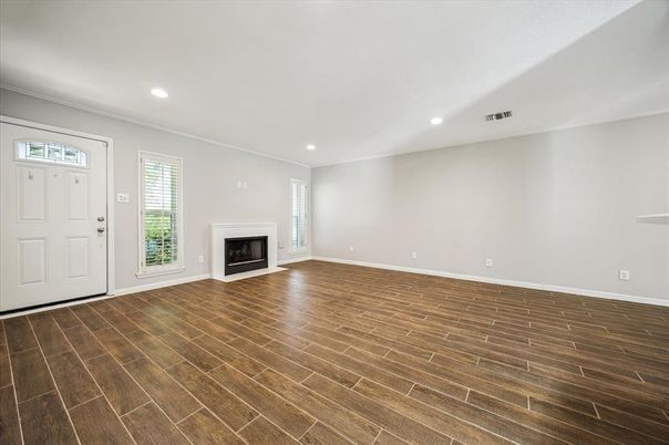 Empty room, Fireplace, Interior, Recessed Lighting, Wood Texture Flooring