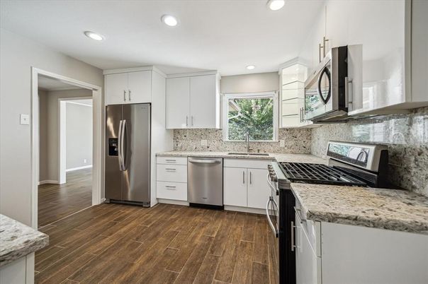 Interior, Kitchen, Recessed Lighting, Stainless Steel Appliances, Wood Texture Flooring