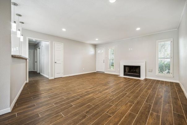 Empty room, Fireplace, Interior, Pendant Lights, Recessed Lighting, Wood Texture Flooring