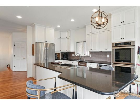 Chandelier, Interior, Kitchen, Pendant Lights, Recessed Lighting, Stainless Steel Appliances, Wood Texture Flooring