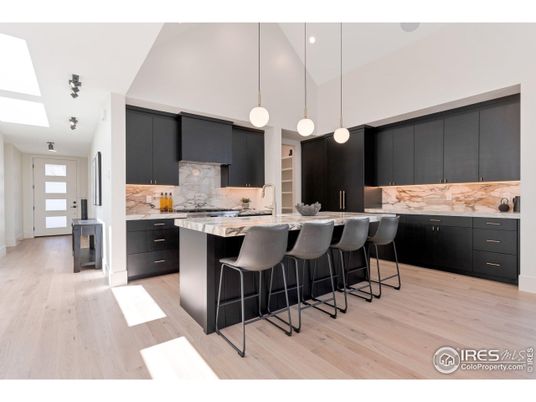 Interior, Kitchen, Marble Walls, Pendant Lights, Recessed Lighting, Wood Texture Flooring