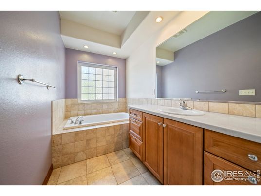 Bathroom, Dual Sink Vanities, Interior, Recessed Lighting, Tile Countertops