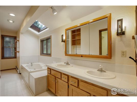 Bathroom, Dual Sink Vanities, Interior, Recessed Lighting, Tile Countertops
