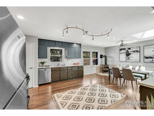 Dining room, Interior, Kitchen, Recessed Lighting, Stainless Steel Appliances, Wood Texture Flooring