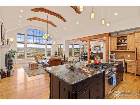 Chandelier, Dining room, Fireplace, Interior, Kitchen, Living room, Recessed Lighting, Wooden Beams, Wood Texture Flooring