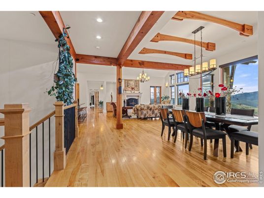 Chandelier, Dining room, Fireplace, Interior, Pendant Lights, Recessed Lighting, Wooden Beams, Wood Texture Flooring