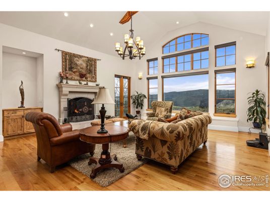 Chandelier, Fireplace, Interior, Living room, Recessed Lighting, Wood Texture Flooring