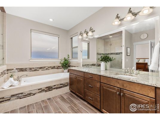 Bathroom, Dual Sink Vanities, Glass Shower, Interior, Recessed Lighting, Wood Texture Flooring