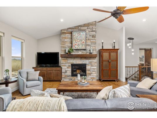 Fireplace, Interior, Living room, Pendant Lights, Recessed Lighting, Stone Walls, Wood Texture Flooring