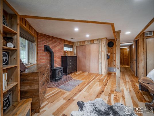 Fireplace, Interior, Recessed Lighting, Stone Walls, Wood Texture Flooring, Wooden Walls