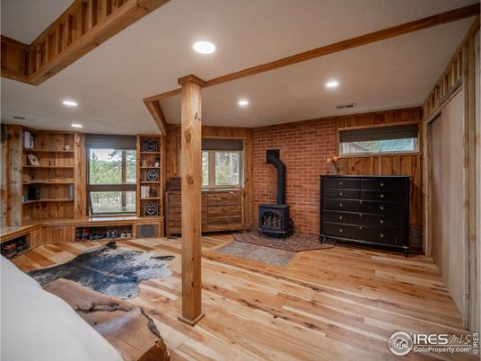 Fireplace, Interior, Recessed Lighting, Stone Walls, Wood Texture Flooring, Wooden Walls