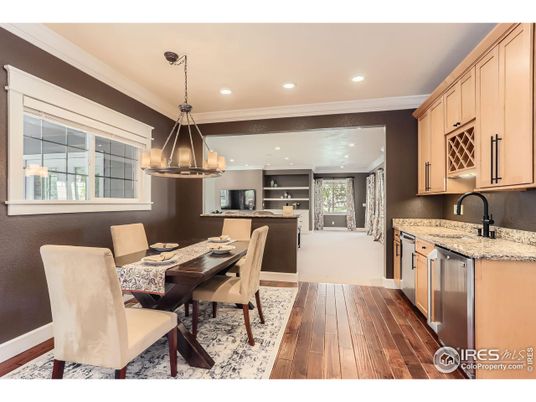 Chandelier, Dining room, Interior, Kitchen, Pendant Lights, Recessed Lighting, Stainless Steel Appliances, Wood Texture Flooring