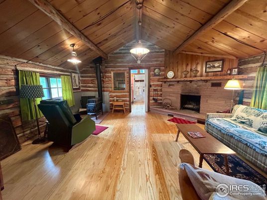 Fireplace, Interior, Living room, Pendant Lights, Wooden Beams, Wooden Ceilings, Wood Texture Flooring, Wooden Walls