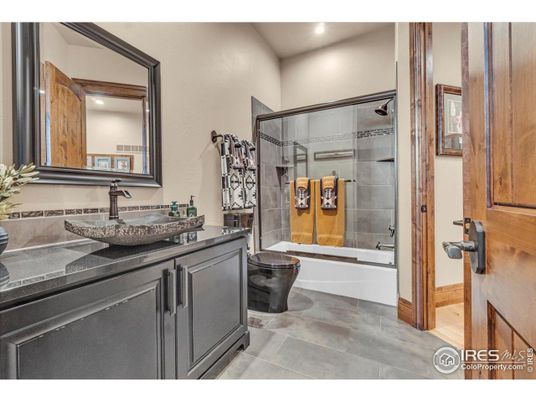 Bathroom, Dual Sink Vanities, Glass Shower, Interior, Recessed Lighting, Tile Countertops