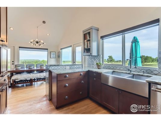 Dining room, Interior, Kitchen, Pendant Lights, Recessed Lighting, Stainless Steel Appliances, Wood Texture Flooring