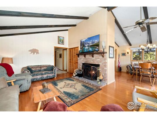 Chandelier, Dining room, Fireplace, Interior, Living room, Wooden Beams, Wood Texture Flooring