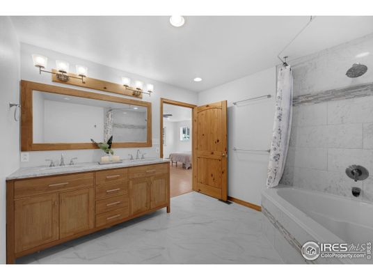 Bathroom, Dual Sink Vanities, Interior, Marble, Marble Walls, Recessed Lighting