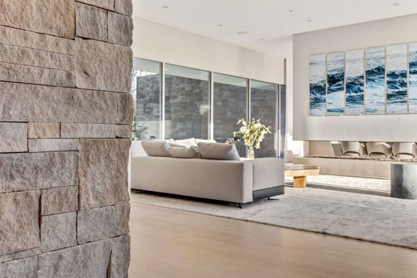 Fireplace, Interior, Living room, Recessed Lighting, Stone Walls, Wood Texture Flooring