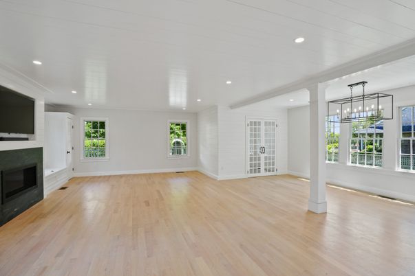 Empty room, Fireplace, Interior, Pendant Lights, Recessed Lighting, Wood Texture Flooring