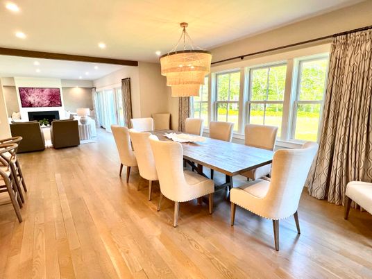 Chandelier, Dining room, Fireplace, Interior, Living room, Recessed Lighting, Wood Texture Flooring