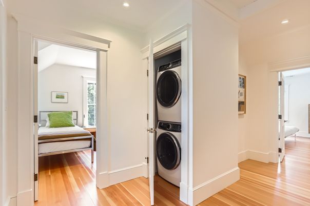 Bedroom, Interior, Recessed Lighting, Utility Closets, Washer, Wood Texture Flooring