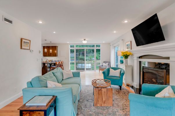 Dining room, Fireplace, Interior, Living room, Pendant Lights, Recessed Lighting, Wood Texture Flooring